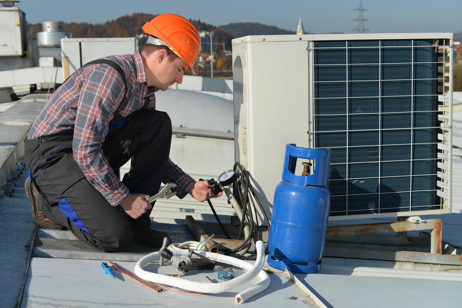 McQuade Heating & Cooling Plumbing & Refrigeration logo
